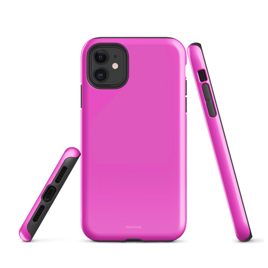 Fuchsia pink iPhone case with a sleek dual-layer design, featuring a shock-resistant outer shell and soft inner lining for impact protection.